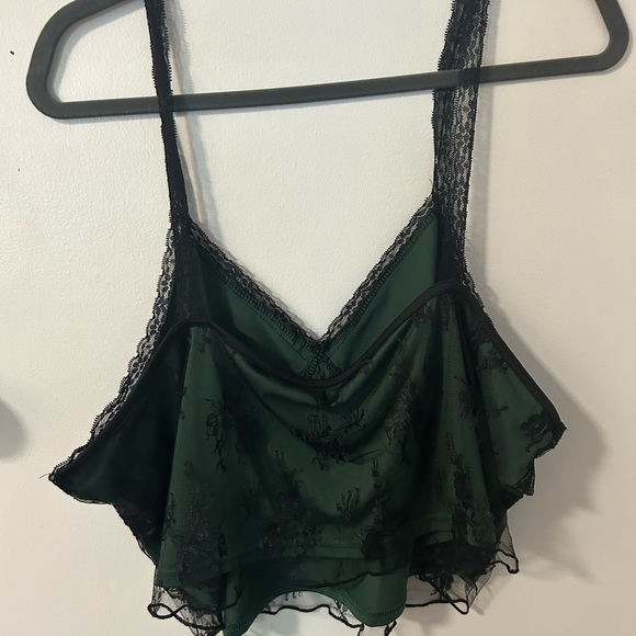 Plus size, 90s inspired, crop top. It is a dark green with a black lace overlay. - Picture 3 of 3